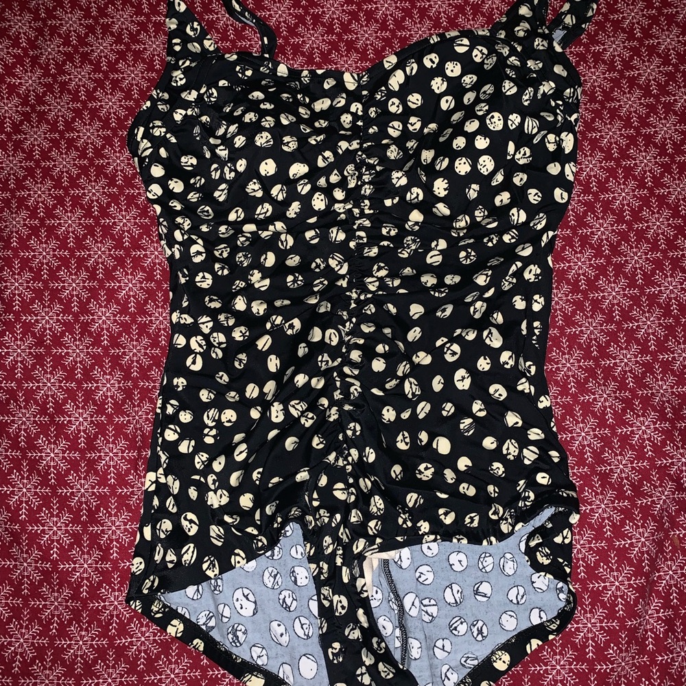 Woman’s one piece suit.
